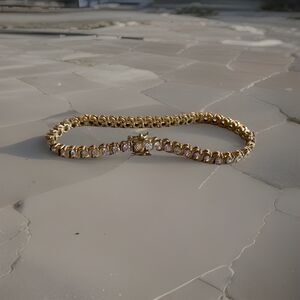 Gold Tone Tennis Bracelet with Round White Stones